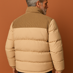 Men’s puffer jacket in beige with corduroy detail, warm and comfortable for casual and stylish winter outfits.