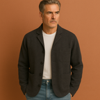 Men’s checkered blazer in black with a modern fit and timeless pattern, ideal for casual and semi-formal occasions.