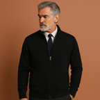 Men’s zipped jacket in black with high collar and front pockets, stylish and comfortable for spring and fall outfits.