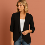 Women’s crochet cardigan in black with open front, airy and comfortable for casual and bohemian outfits.