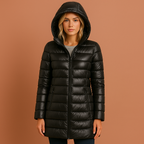 Women’s quilted jacket in black with detachable hood and lightweight design, warm and comfortable for casual fall and winter outfits.
