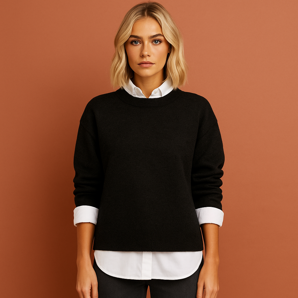 Women’s oversized casual sweater in black with minimalist design, soft and comfortable for casual and stylish outfits.