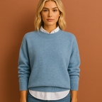 Women’s sweater in blue with minimalist design, soft and comfortable for casual and stylish outfits.
