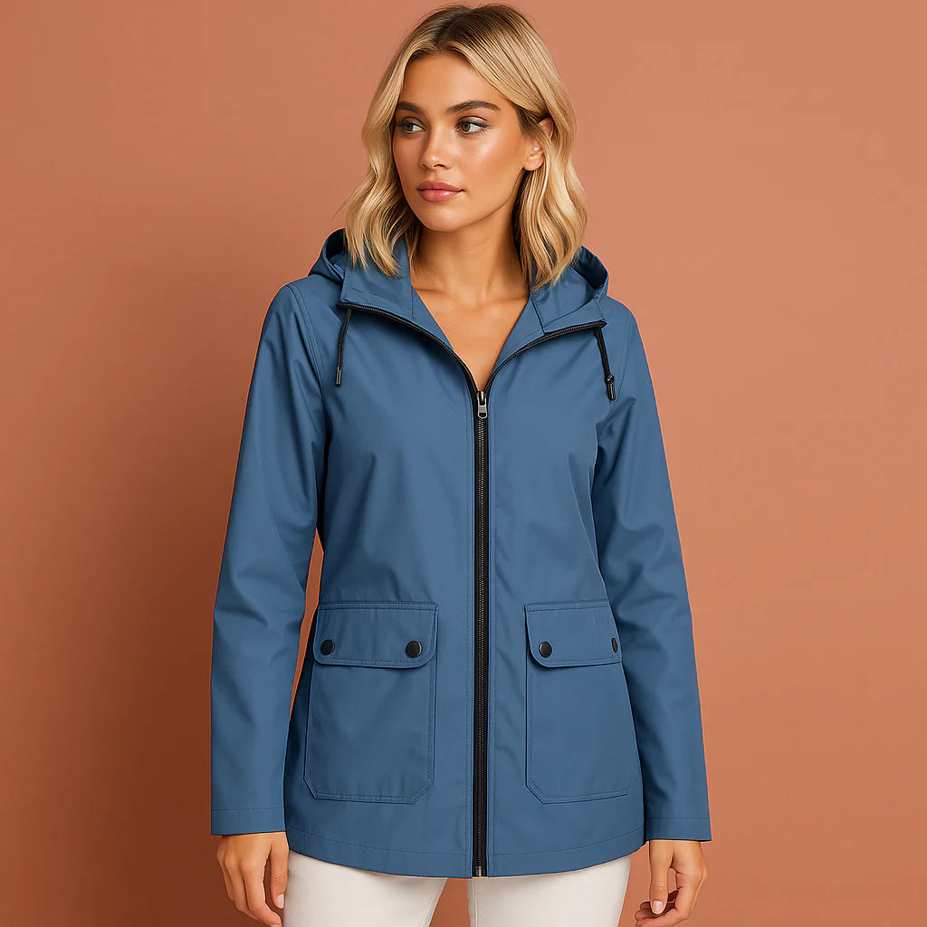 Women’s waterproof jacket in blue with adjustable hood, soft and comfortable for casual and stylish outfits.