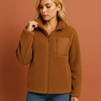 Women’s teddy zip jacket in brown with cozy fit and high collar, perfect for stylish cold-weather outfits.
