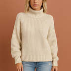Women’s turtleneck sweater in cream with minimalist design, soft and comfortable for casual and stylish outfits.