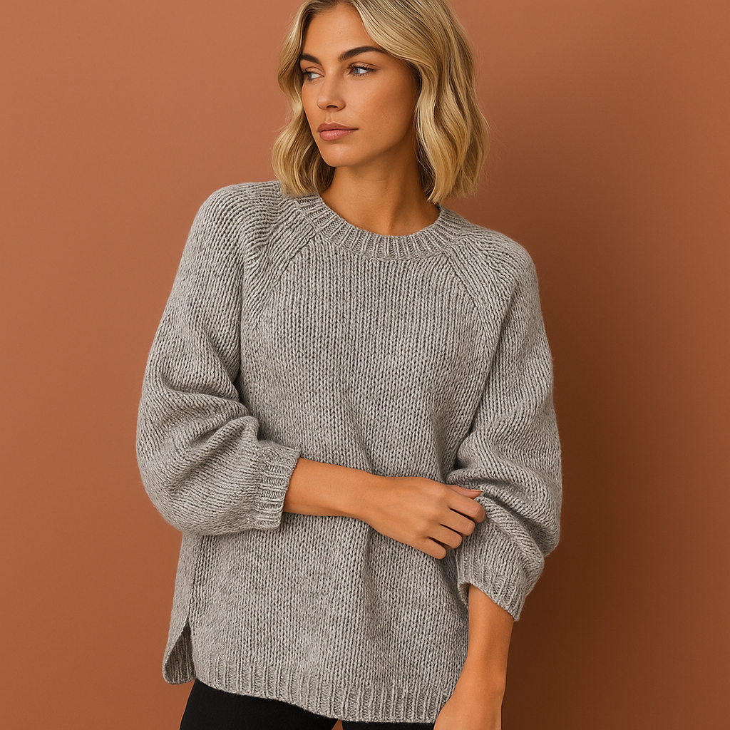 Women’s oversized knitted sweater in gray with casual winter style, soft and comfortable for cozy and stylish outfits.