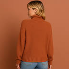 Women’s turtleneck sweater in orange with minimalist design, soft and comfortable for casual and stylish outfits.