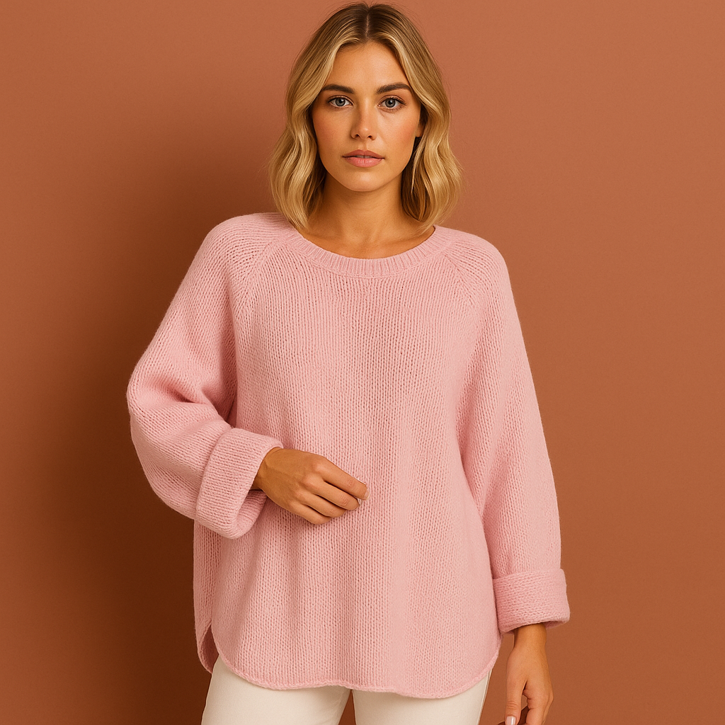Women’s oversized knitted sweater in pink with casual winter style, soft and comfortable for cozy and stylish outfits.
