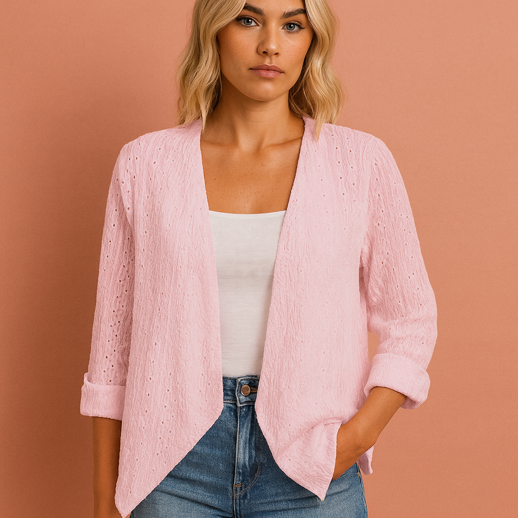 Women’s crochet cardigan in pink with open front, airy and comfortable for casual and bohemian outfits.