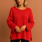 Women’s oversized knitted sweater in red with casual winter style, soft and comfortable for cozy and stylish outfits.