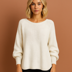 Women’s oversized knitted sweater in white with casual winter style, soft and comfortable for cozy and stylish outfits.