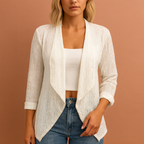 Women’s crochet cardigan in white with open front, airy and comfortable for casual and bohemian outfits.