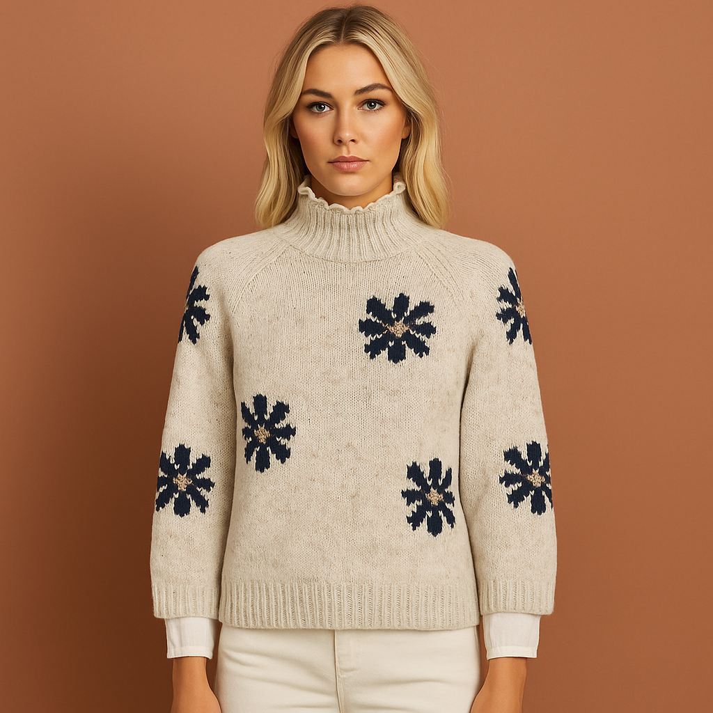 Women’s knitted sweater in white with brown and grey floral pattern, soft and comfortable for casual and stylish outfits.